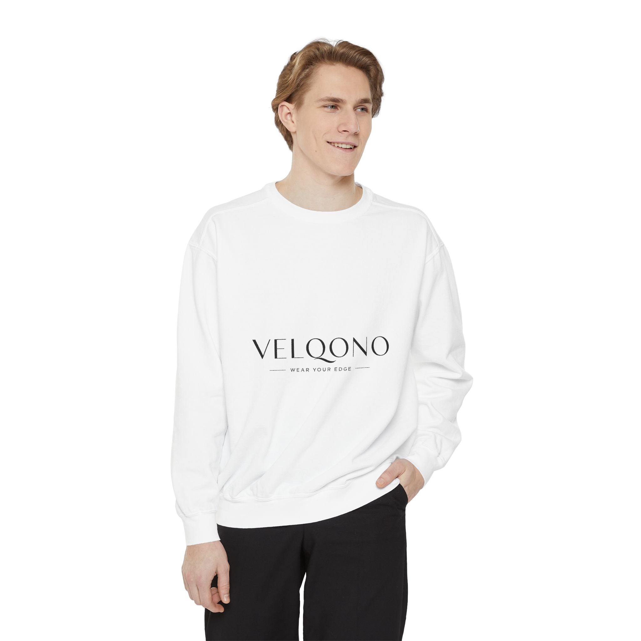 Man wearing a white long-sleeve shirt with text on a white background