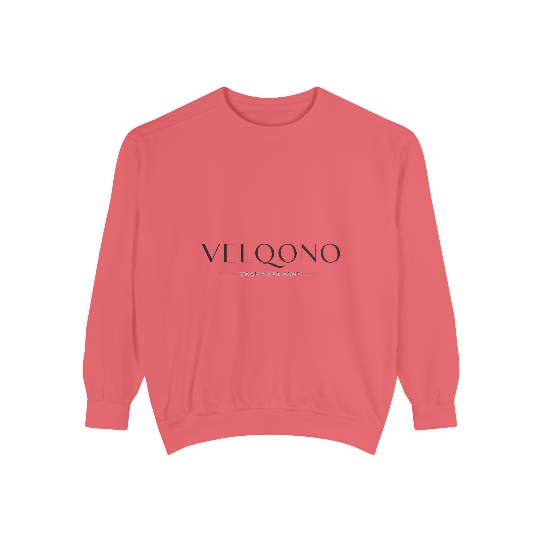 A coral pink crewneck sweatshirt with 'VELQONO' printed in black serif font across the chest, displayed on a clean white background.